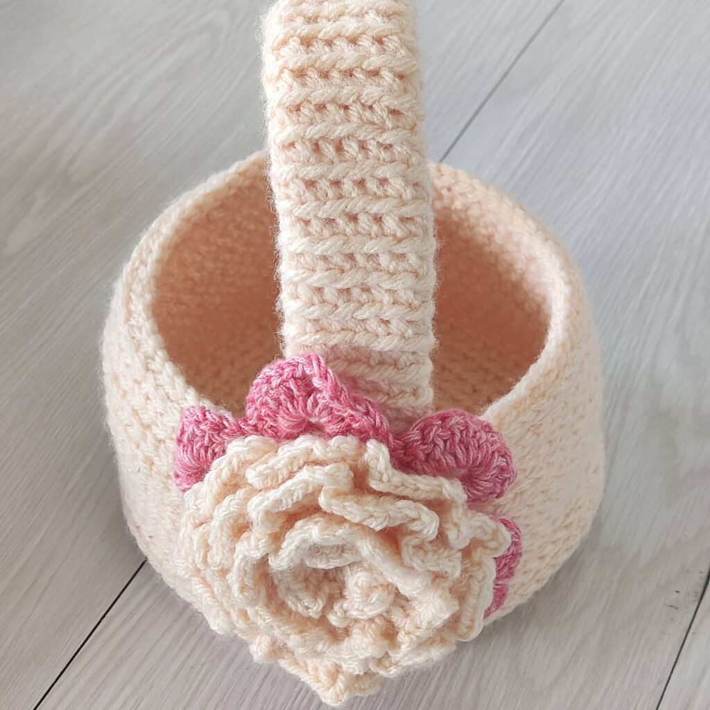 Crochet Easter Basket Pattern. with a beautiful flower attached