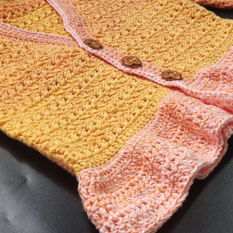 Peplum crochet baby cardigan