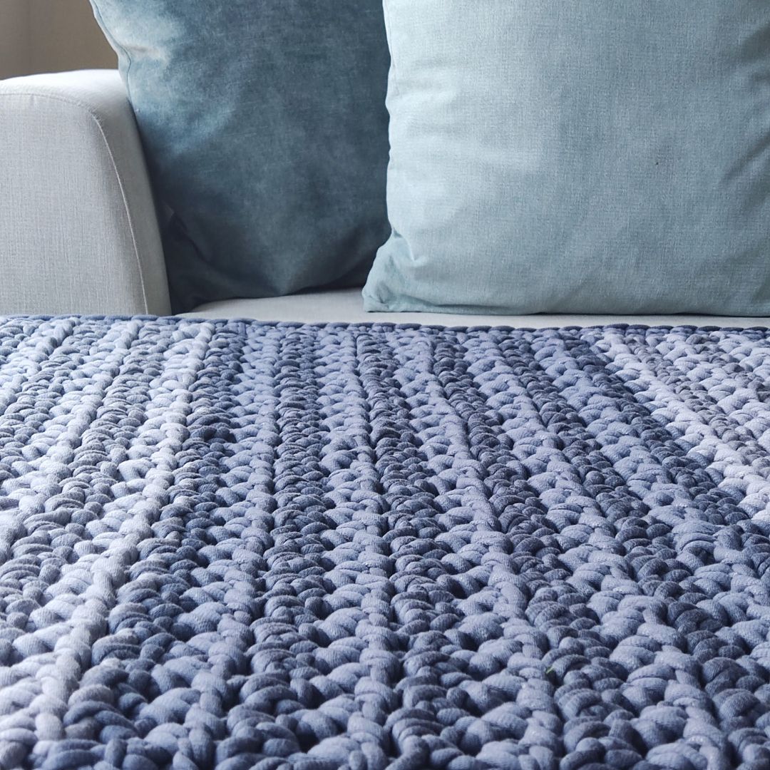 Cozy and warm in this throw by using the Chunky Crochet blanket free pattern